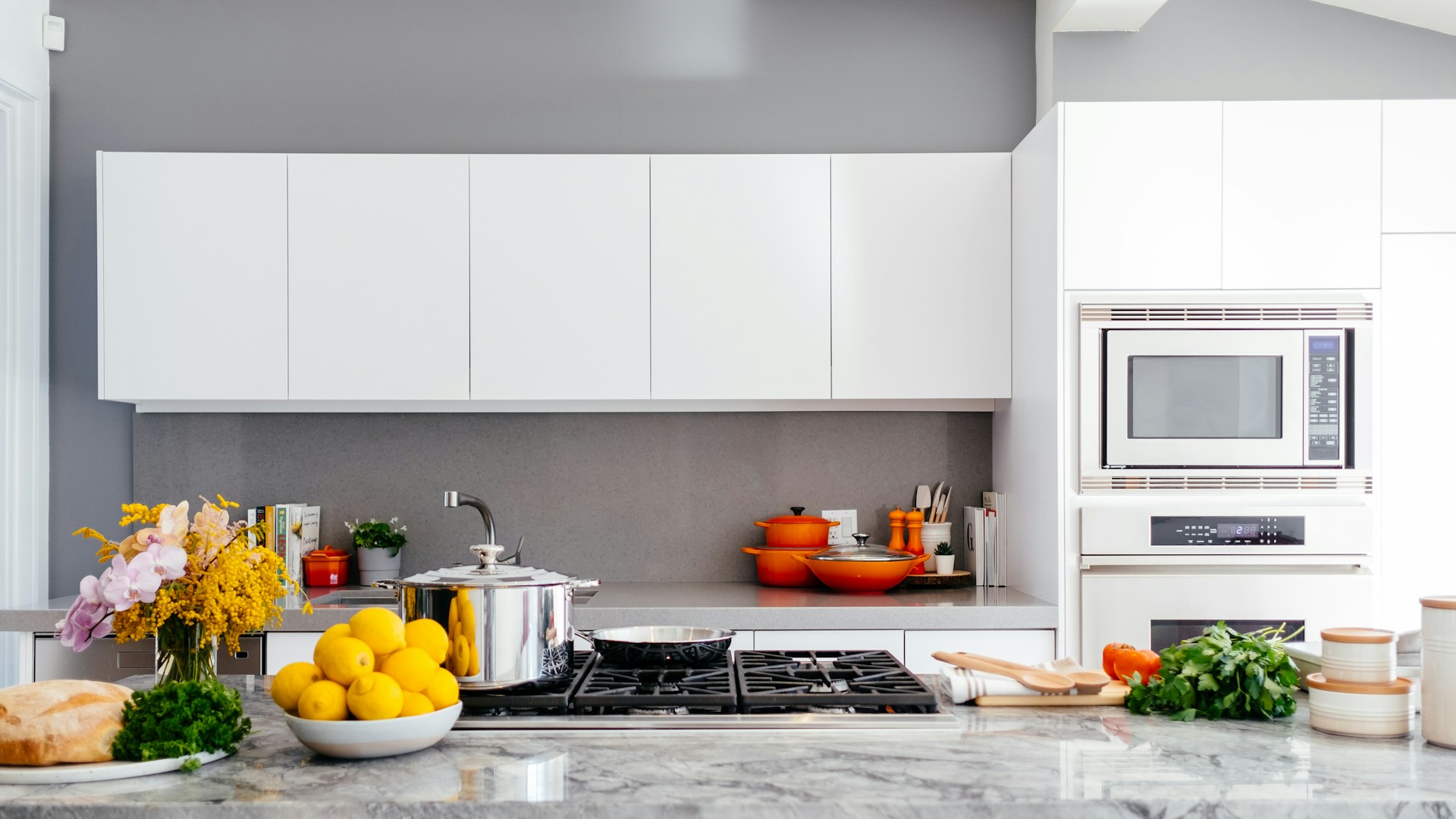 Modern commercial kitchen with stainless steel cooking equipment